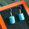 Turquoise earrings in a jewelry box