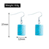 Turquoise square stone earrings with measurements and weight on a white background